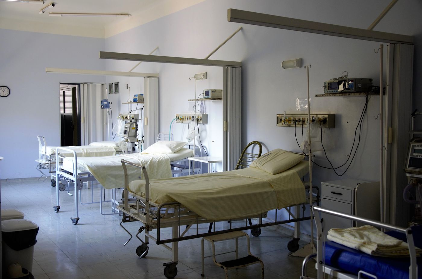 Hospital corridor with clinical staff